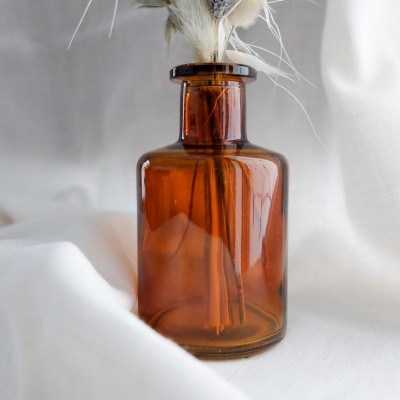 Bouquet de fleurs séchées et son vase en verre apothicaire