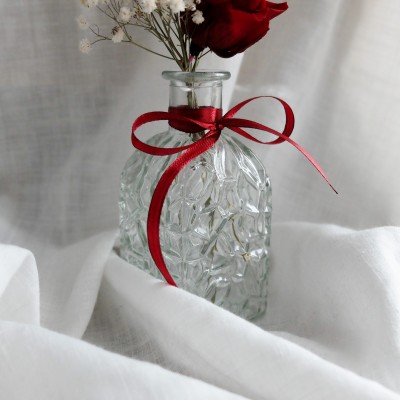 Bouquet de fleurs séchées et stabilisées et son vase en verre